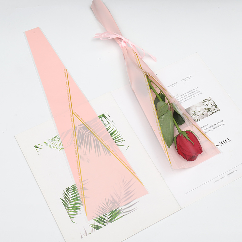 Nueva tienda de flores material de embalaje floral Día de San Valentín flor Rosa bolsa de embalaje ramo bolsa de triángulo corona bolsa individual