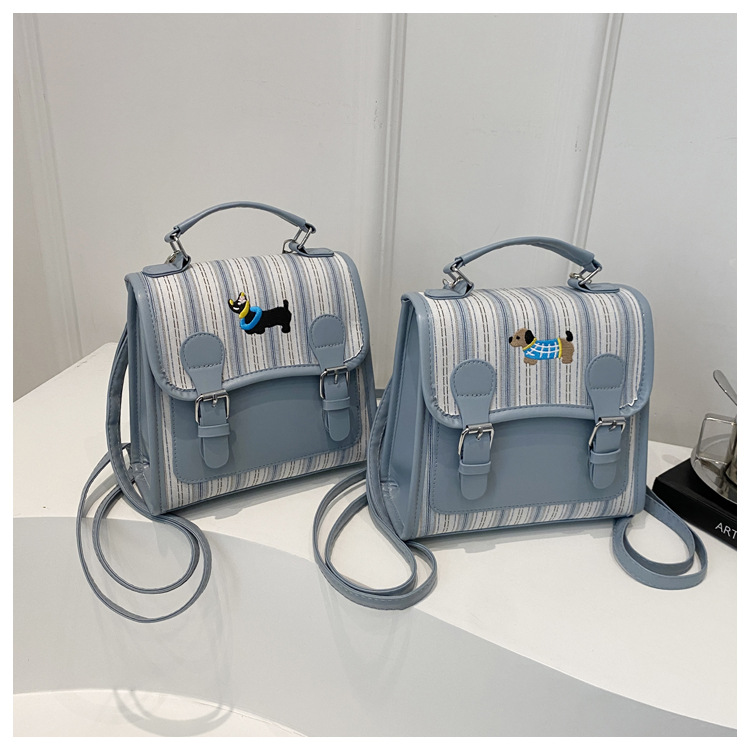 The new backpack for the autumn of 2024 is a fashionable and simple hand-held student single-shoulder bag with a checkered lid and a retro crossbody style undefined