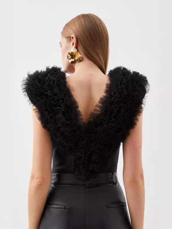 Europa y América Primavera/Verano Maillard Tops ajustados de alta gama Diseño femenino Cuello en v Tops de malla hinchada Estilo de temperamento de mujer image 5
