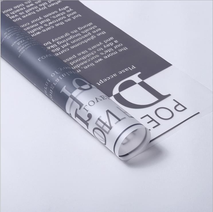 Fabricante de fiestas de flores al por mayor nuevo patrón de amor de San Valentín papel de embalaje de flores floristería translúcida ramo de flores