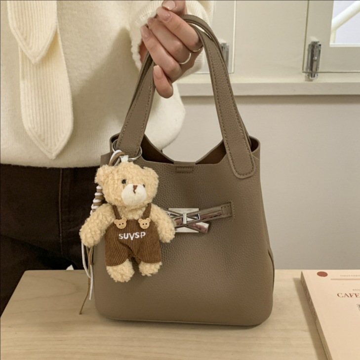 Bolsa de viaje coreana para niños y madres, bolso de balde de mano de mujer de alto nivel, bolso de lichi transfronterizo, bolso de Kelly, bolso de hombro