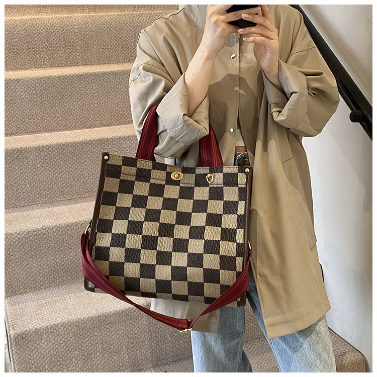 Bolso de patrón leopardo para mujeres 2026 nueva moda retro transfronteriza bolsa de viaje bolsa de tela de bloqueo mochila de hombro