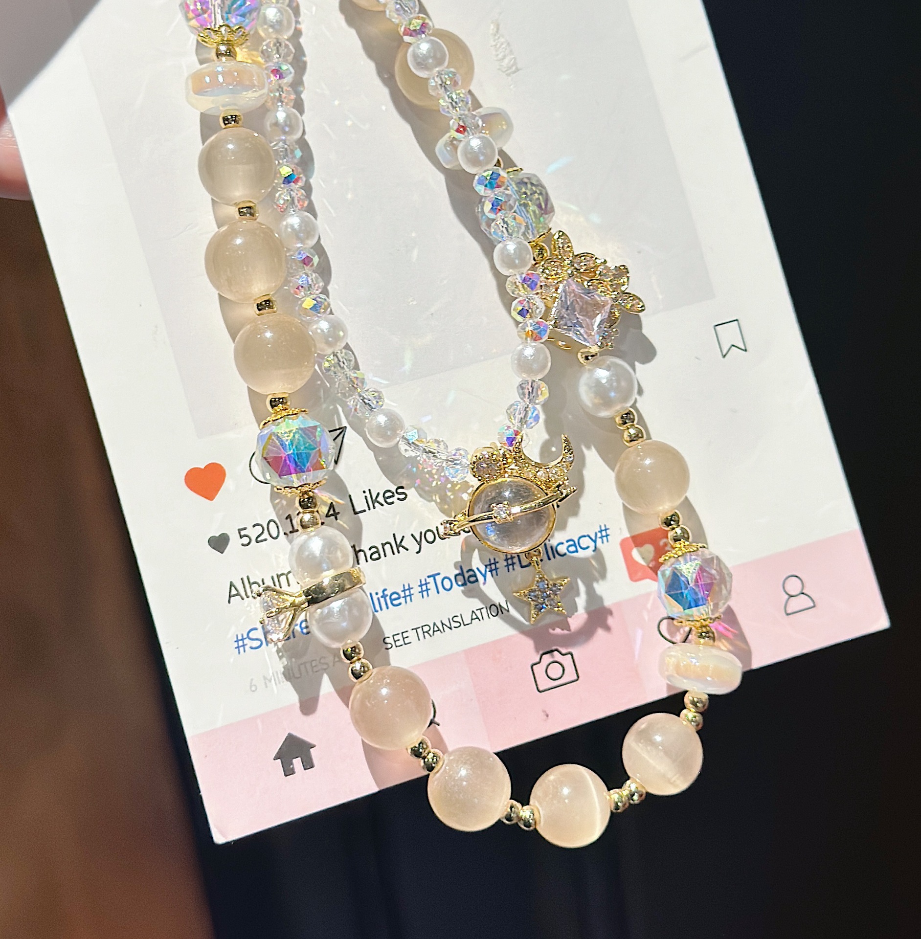 Boutique hecho a mano de alta gama para teléfono móvil cadena larga de vidrio de universo pequeño femenino cordón de teléfono móvil de moda colgante de mensajero largo