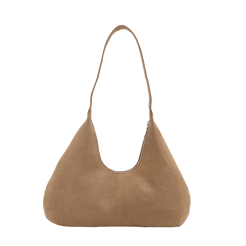 Bolsa de mano de textura retro coreana para mujeres 2025 primavera nuevo estilo de viaje al trabajo molido bolso de hombro axilla