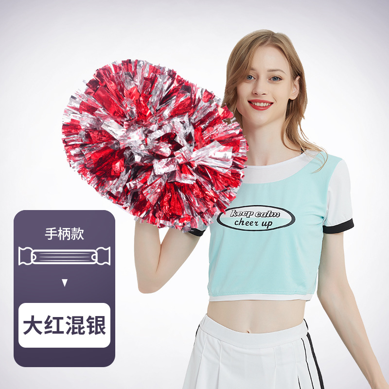 Flor bola de la flor porristas bola de la flor de la mano que sostiene la flor juegos de deportes mano que sostiene apoyos alegría apoyos en stock