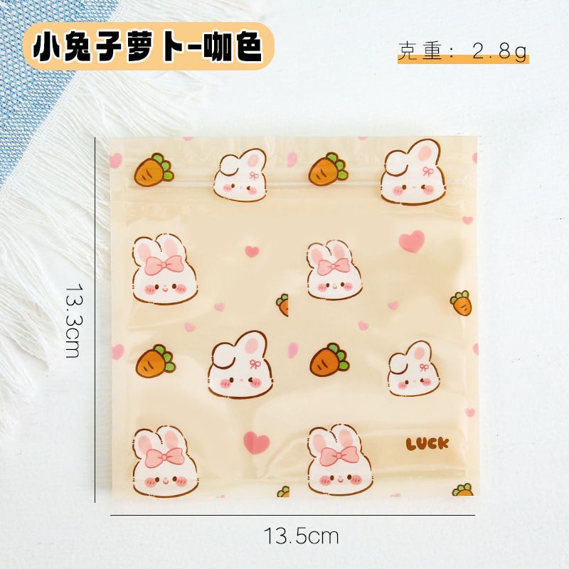 Bolsa de sello láser especial de dibujos animados encantadora bolsa de sellado translúcida pequeña galleta snack bolsa de embalaje de joyas