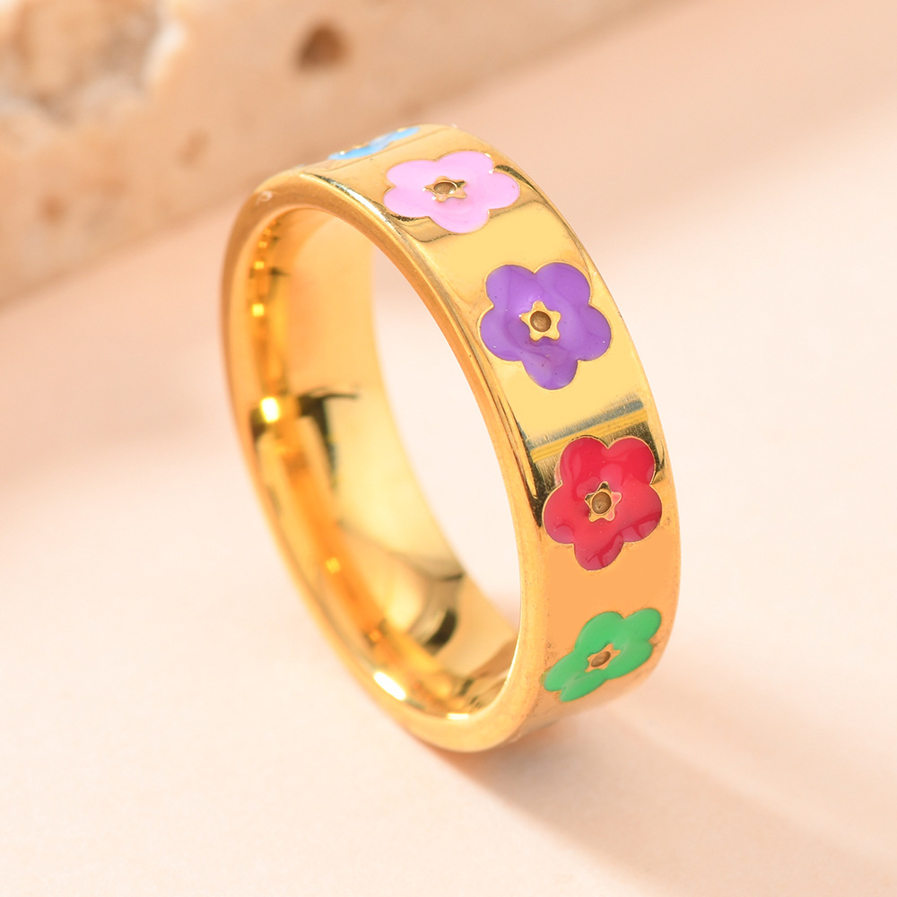 Joyas de acero de titanio creativas bonitas flores de oro gota de aceite de color amor anillo de acero inoxidable fabricantes de mujeres image 2