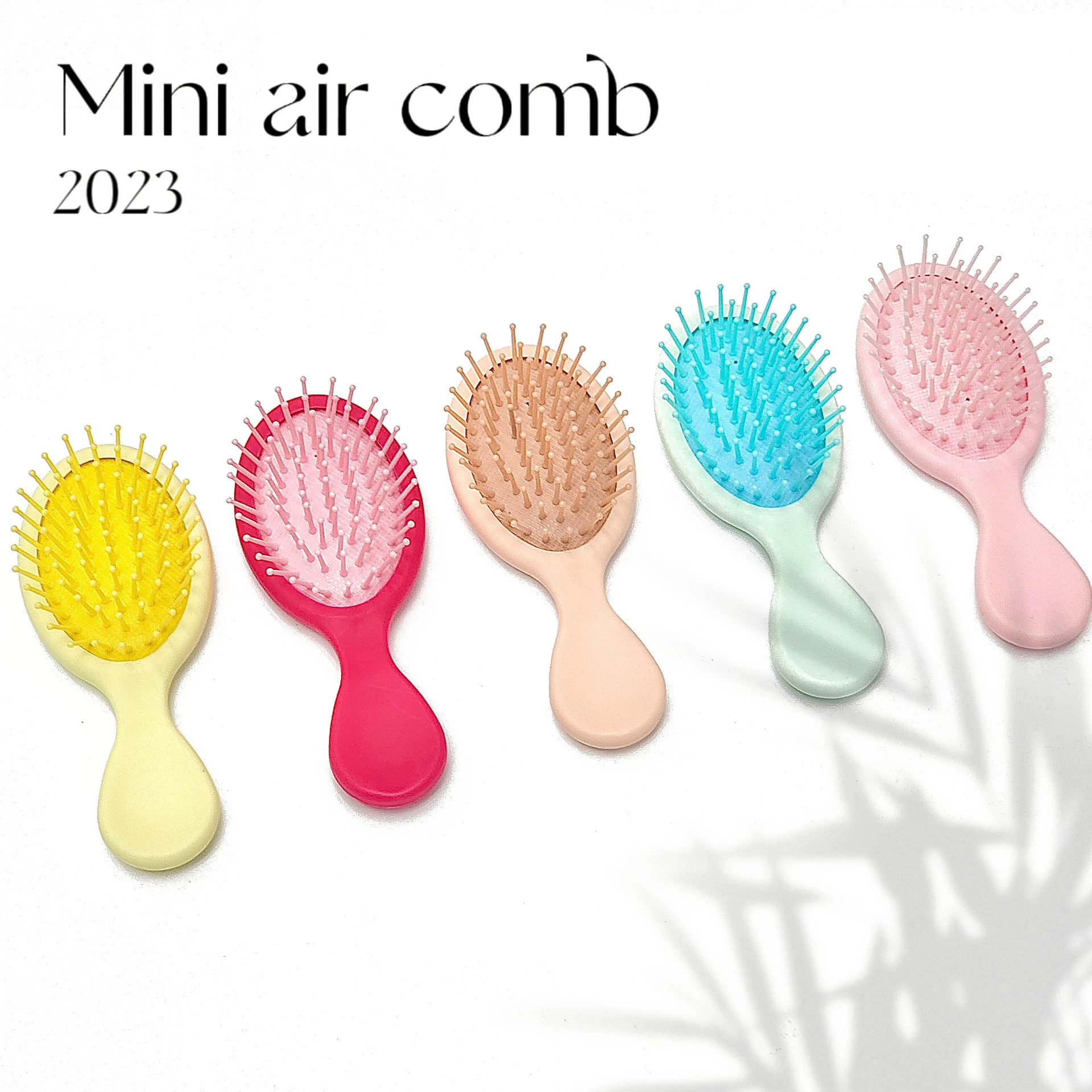 Small massager, soft heel, cute air bag, handheld brush