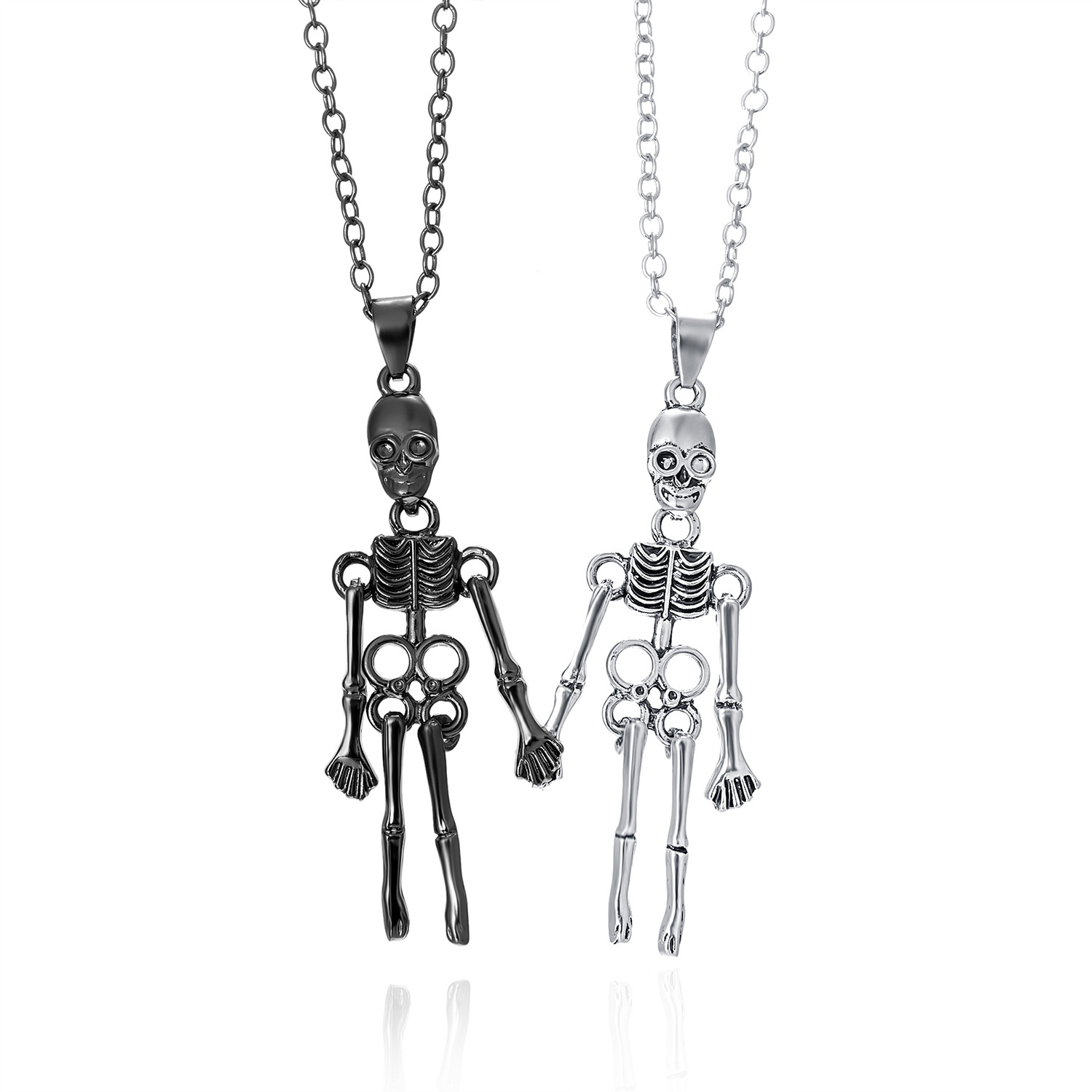 Collana con ciondolo di coppia in stile dark per Halloween, con teschio umano e fantasma che tiene la mano_voghion.com