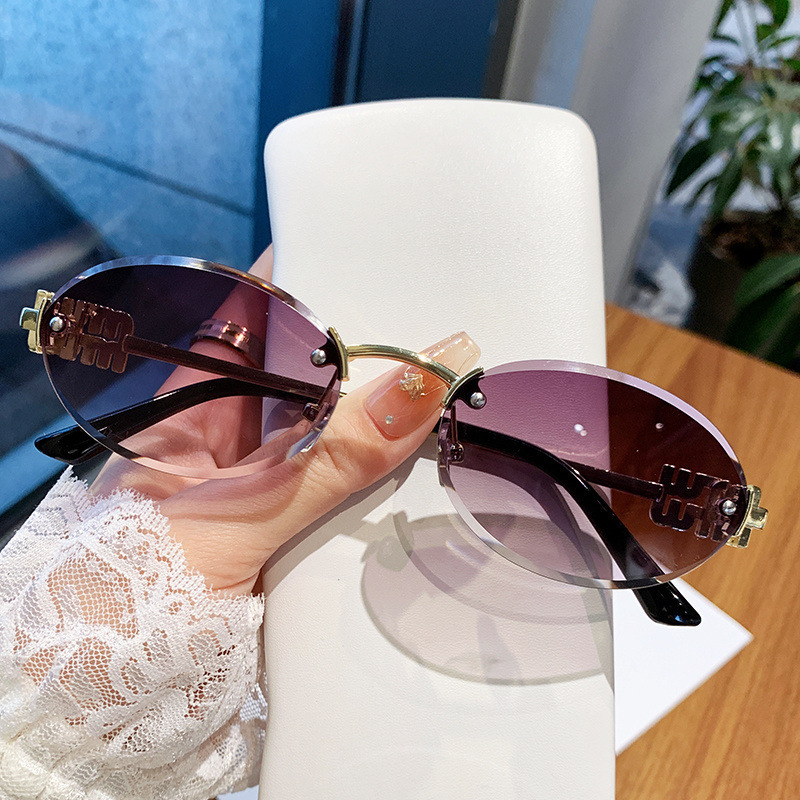 新款m字母缪家椭圆无框太阳镜金属复古小框网红街拍墨镜现货批发