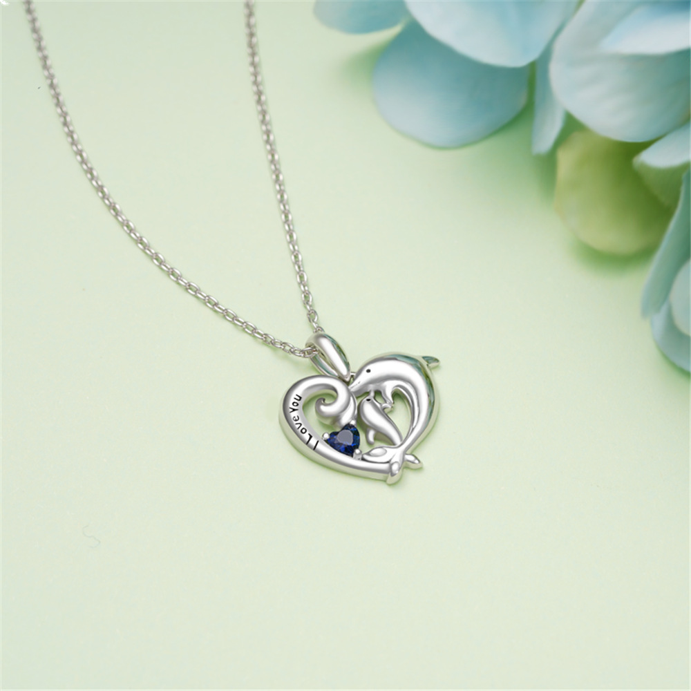 Collar con colgante de delfín y corazón en cristal azul mujer_voghion.com
