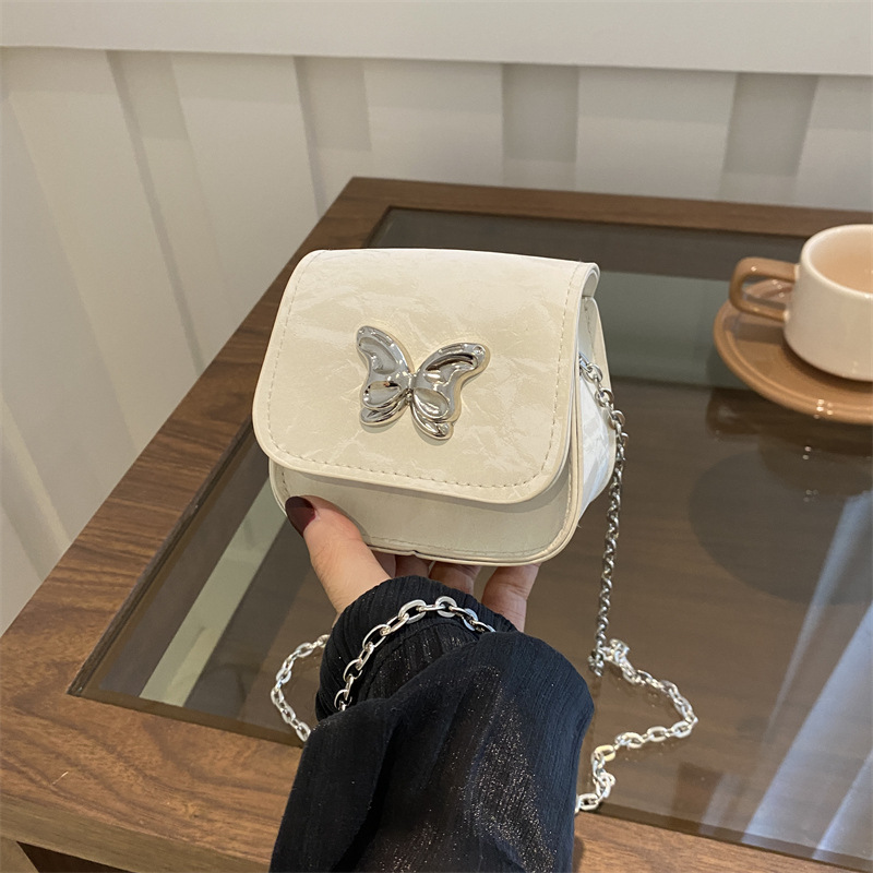Mariposa de personalidad estética francesa 2024 otoño nuevo color sólido casual moda cadena mensajero hombro pequeño bolso cuadrado mujer
