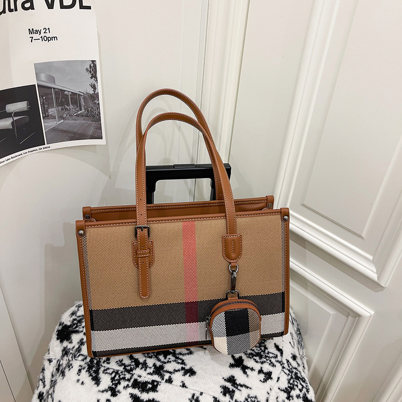 Korean Style Large-Capacity Women's Shoulder Bag 2026 New Model Handbag Simple Vertical Stripe Casual Tote Bag Fashion Korean Style Large-Capacity Women's Shoulder Bag 2026 New Model Handbag Simple Vertical Stripe Casual Tote Bag Fashion