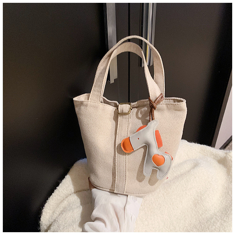Bolso de mezclilla lindo de los niños de las mujeres 2023 Otoño Nuevo estilo coreano bolso de cubo de tela de color sólido para niños
