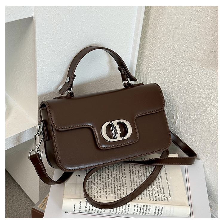 Bolso de mano de alta sensación para mujeres 2026 nuevo temperamento retro mochila de hombro pequeño bolso de lujo ligero