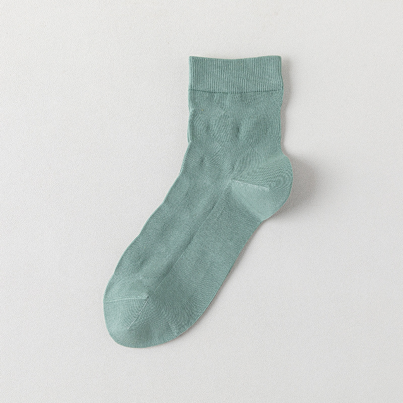 Calcetines de algodón de color sólido para hombres primavera y otoño medio tubo de diamante sin hueso transpirable absorción de sudor embalaje independiente calcetines de hombre al por mayor