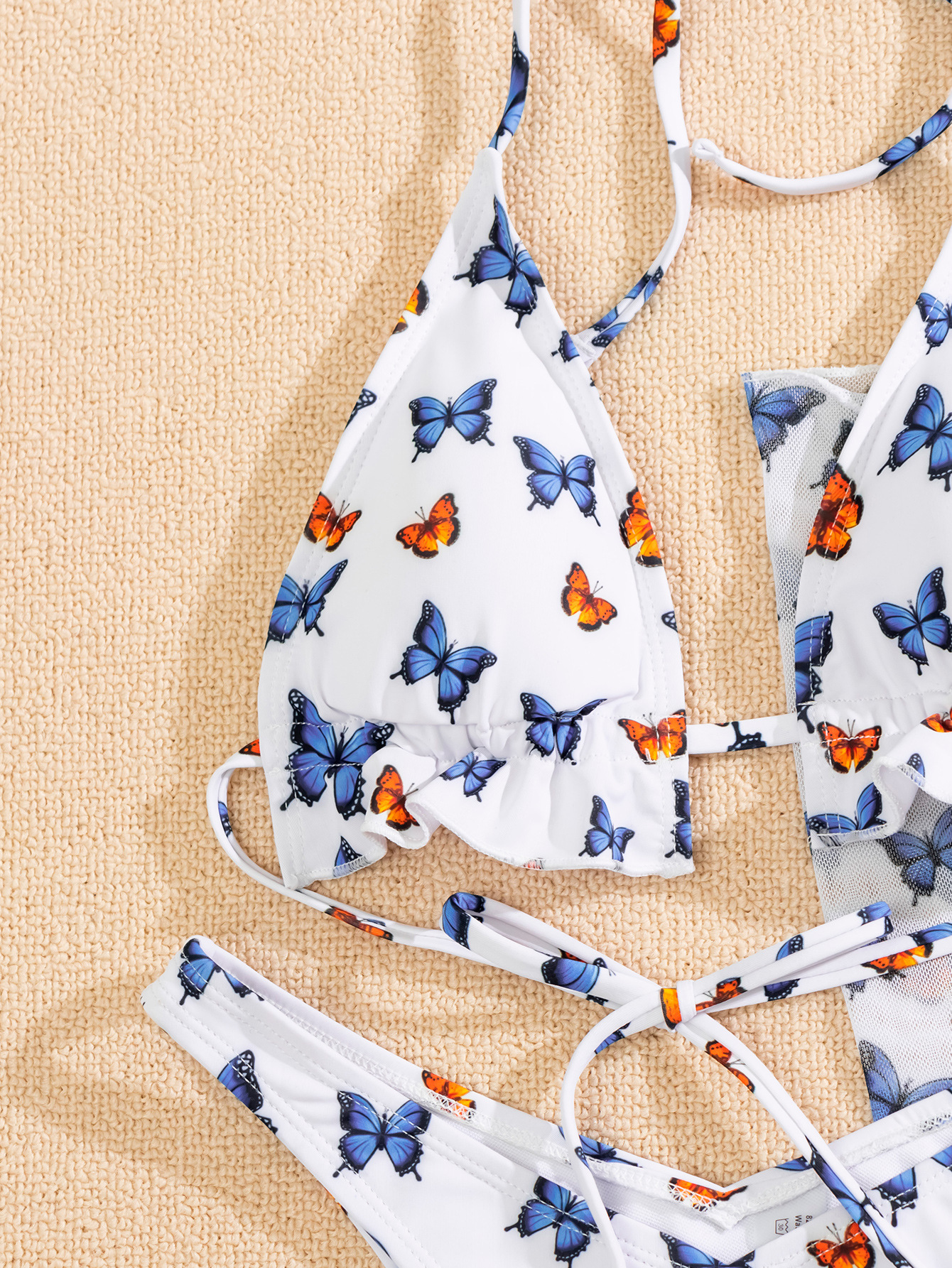 bikini dividido con estampado de mariposas NSZO27211