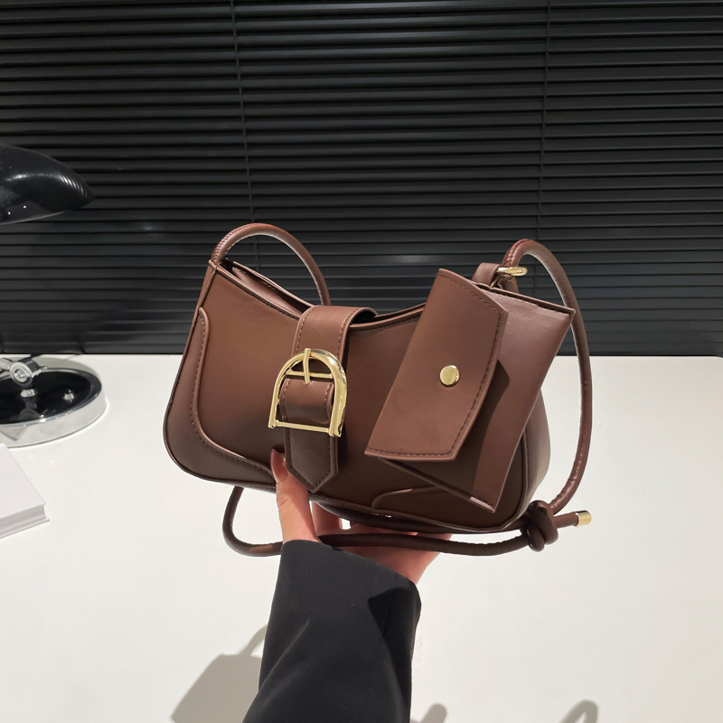 2024 invierno nuevo estilo de moda extranjero cinturón retro texturas coreanas de hombro único bolso de brazo portátil de mujer