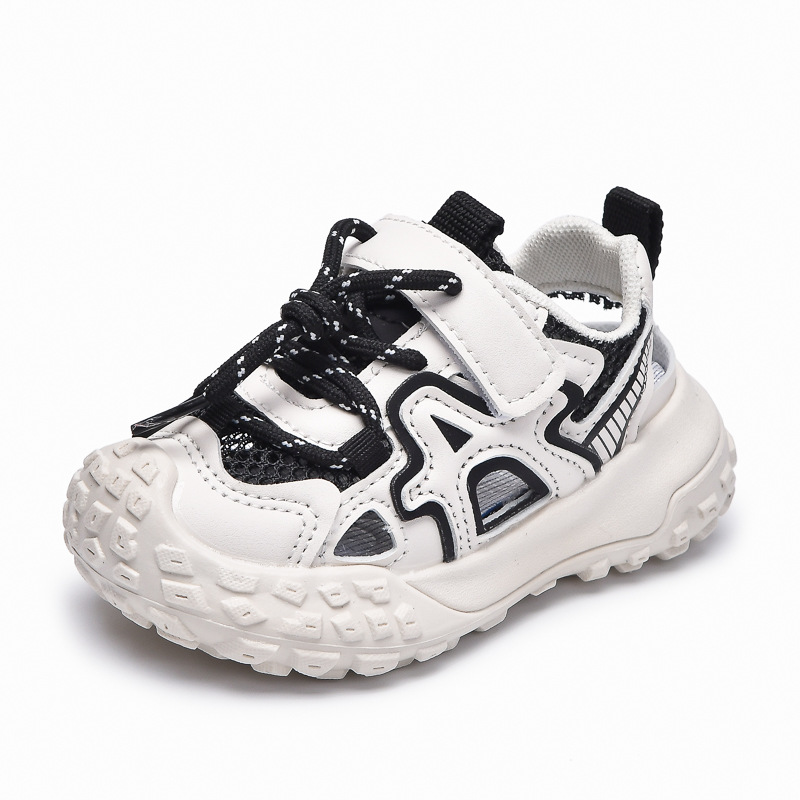 Verano 2025 nuevo estilo sandalias para niños con suela de neumáticos zapatos con marco deportivo hueco Baotou para niños pequeños y medianos zapatos de playa de suela suave