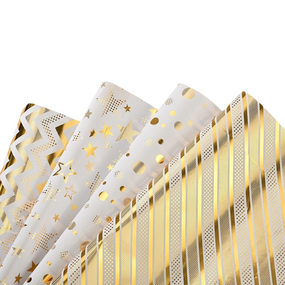 Directo de fábrica nuevo papel de embalaje dorado creativo estrella raya del punto papel de regalo de vacaciones