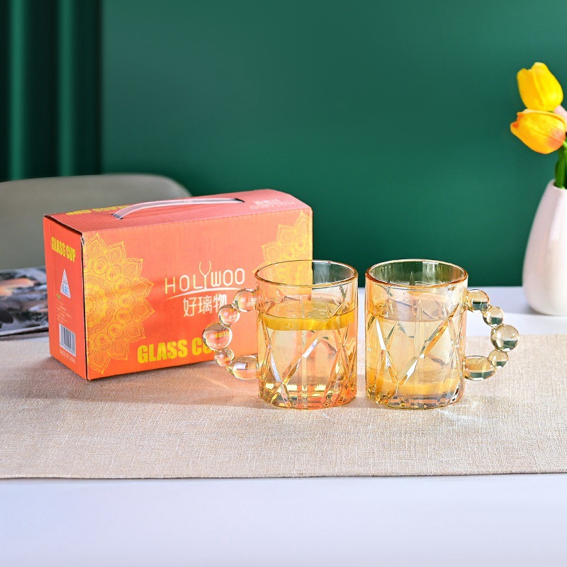 Taza de vidrio de perlas para engrosar taza de café doméstica de alto valor facial taza de leche de jugo fábrica de taza de agua al por mayor