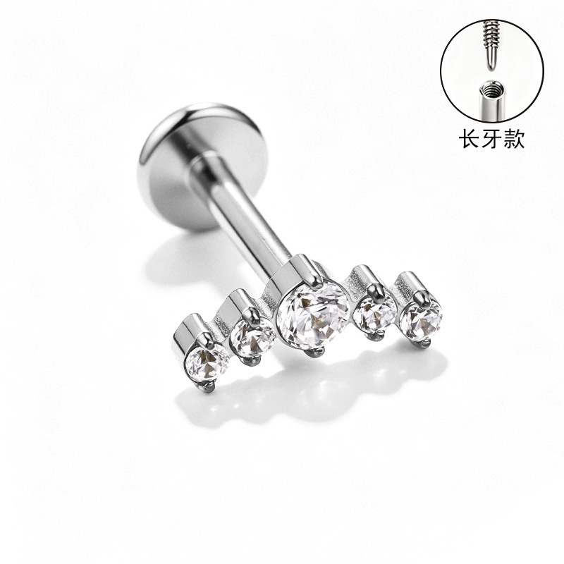 Silver pointed spike labret stud material detail