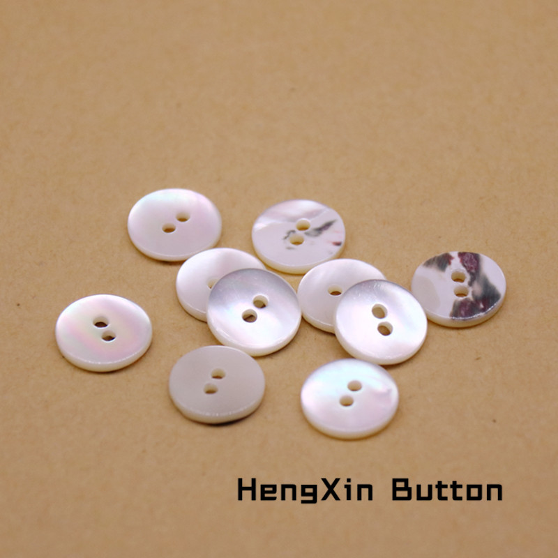 厂家批发高档尖尾螺贝壳纽扣 白色平面二孔塔螺钮扣 丝绸衬衫扣子