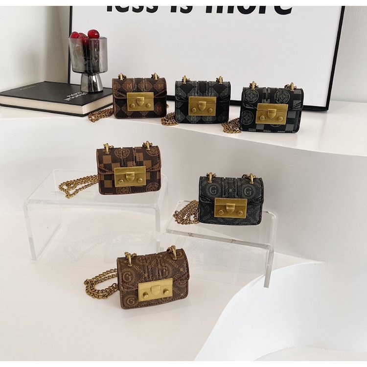 Nicho de moda mini cadena bolso de mujer 2026 nuevo bolso cuadrado simple diario bolso de tela de mujer