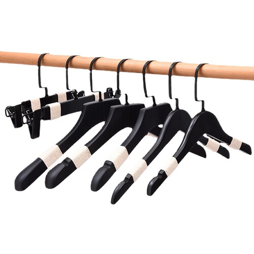Black solid wood anti-slip hanger for men's and women's clothing, specifically designed for clothing stores, invisible pants hanger, wooden wholesale