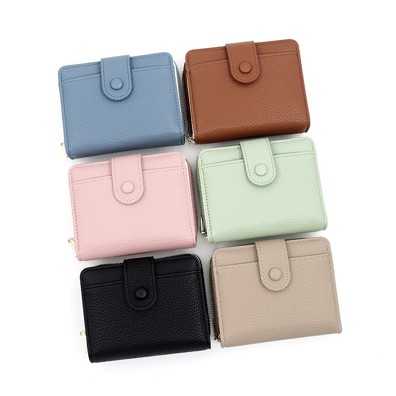 Nueva cartera transfronteriza de las mujeres simple patrón lychee cremallera monedero corto chica cartera al por mayor