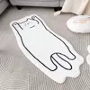 Кот, поднимающий лапу