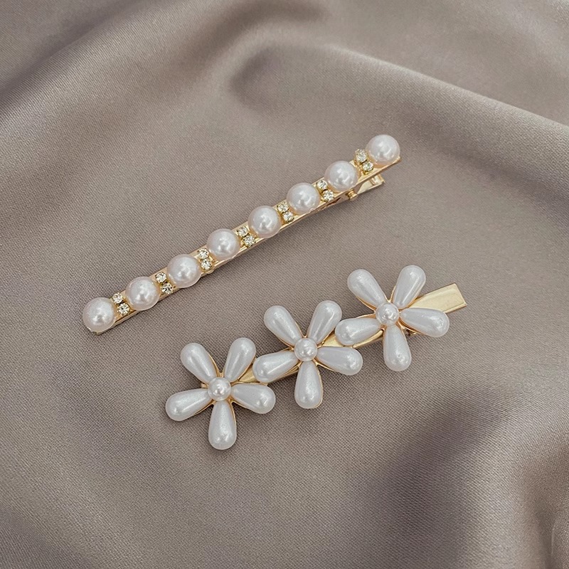 Pequeño clip de cabello de perla clip de cabello de mujer nuevo clip lateral de alta gama exquisita adornamiento para el cabello al por mayor