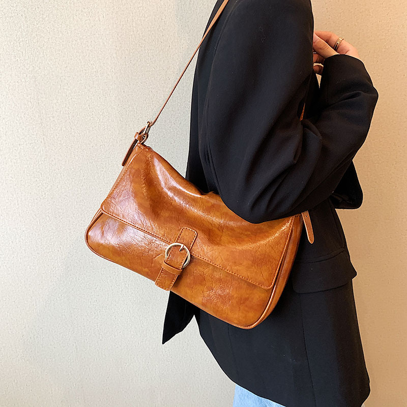 Bolsa de transporte transfronterizo de cuero suave de hombro brazo bolsas de mujer versátiles 2025 nueva gran capacidad bolsas retro