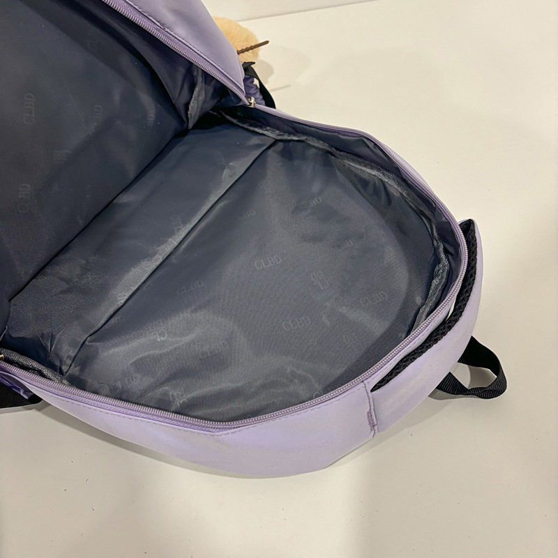 Nueva versión coreana pequeña mochila fresca de nylon de gran capacidad mochila de estudiantes de secundaria secundaria de alto valor de la cara mochila casual