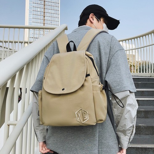 A niche design women's original Japanese lightweight short-distance travel backpack with large capacity, suitable for students and men as a computer and school bag.