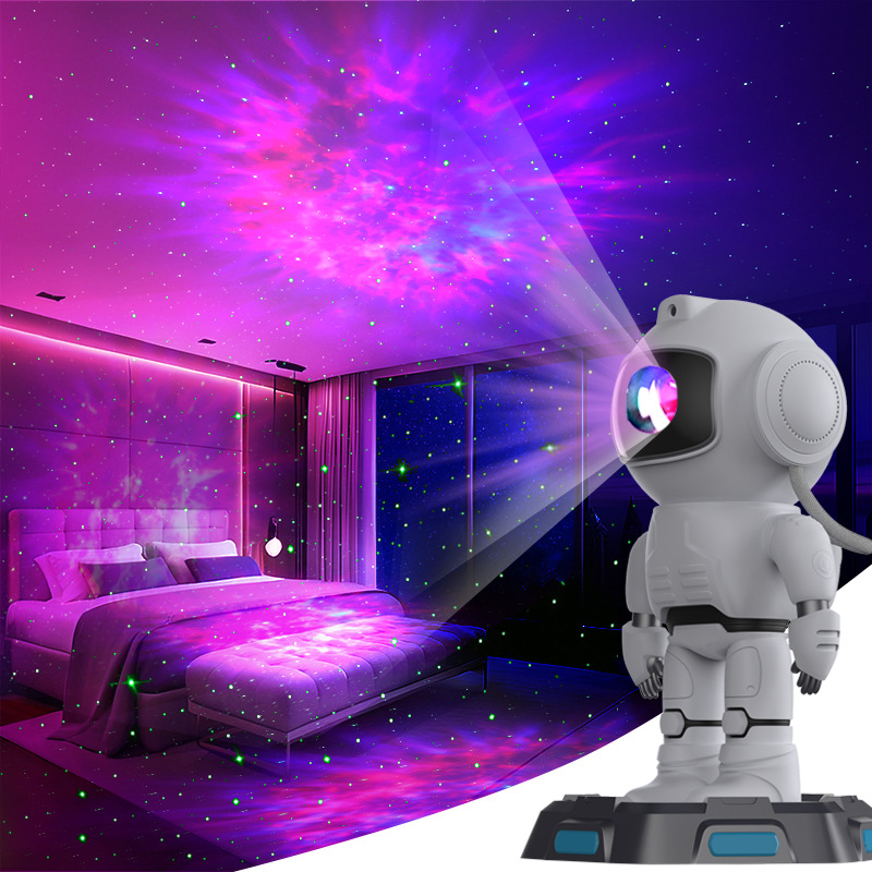 Lámpara de cielo estrellado de astronauta transfronterizo, lámpara de proyección de la luna, lámpara de audio Bluetooth, lámpara de noche de dinosaurio, lámpara de ambiente, luz nocturna