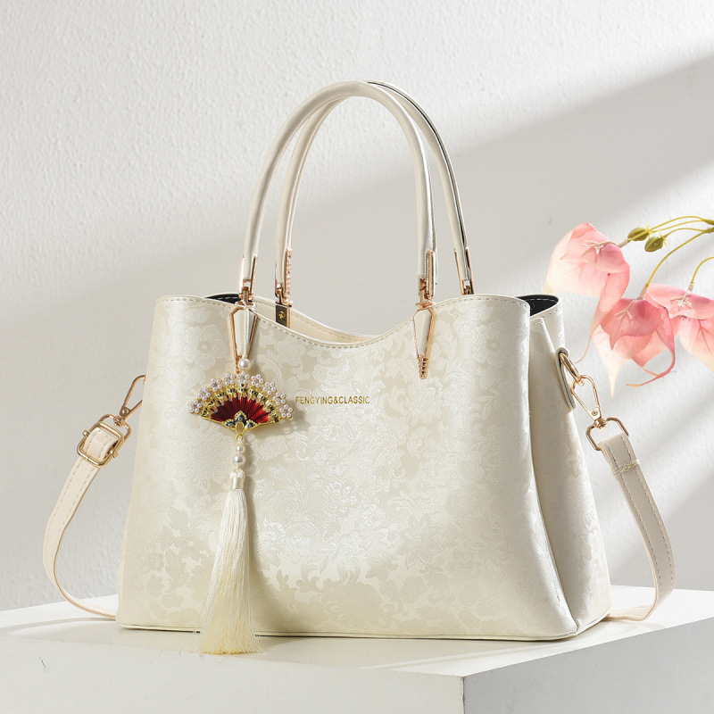 Regalo del Día de la Madre, bolso de moda de madres de mediana edad 2025, nuevo estilo nacional, bolso de mujer chino, bolso de viaje
