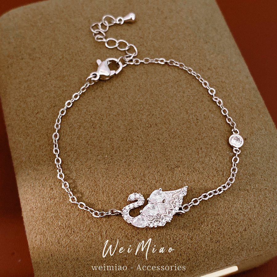 Modas versátiles pulseras de piedra de cisne lujoso ligero nicho pulseras de alta calidad temperamento exquisito joyas personales al por mayor image 4
