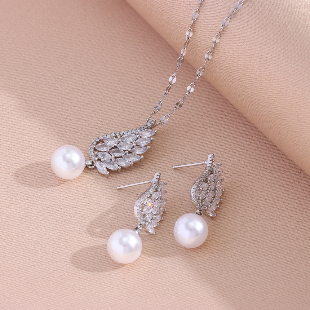 Mode retro temperament silber volle zirkonium feder fransen perle anhänger halskette ohrring set schmuck_voghion.com