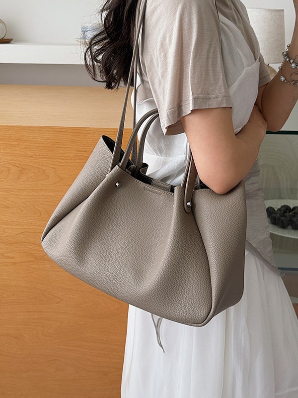 Bolso coreano nicho bolso de brazo bolso de mujer 2026 nueva gran capacidad de transporte universal bolso de hombro