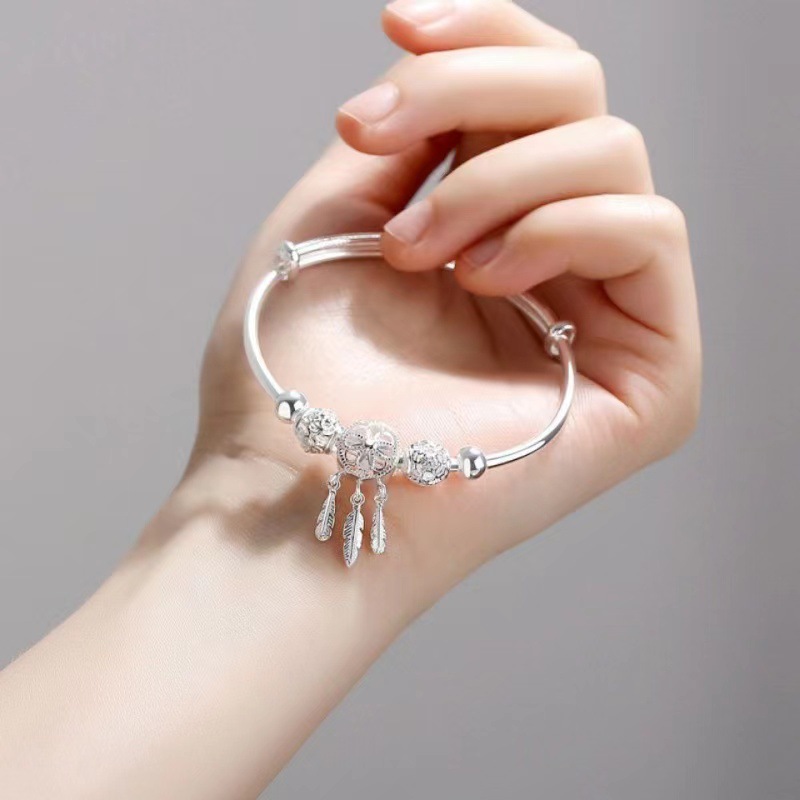 Japonés y coreano caliente-Venta de sueño catcher pluma plata Push-Pull hebilla ajustable pulsera temperamento verano mujeres moda pulsera de cobre