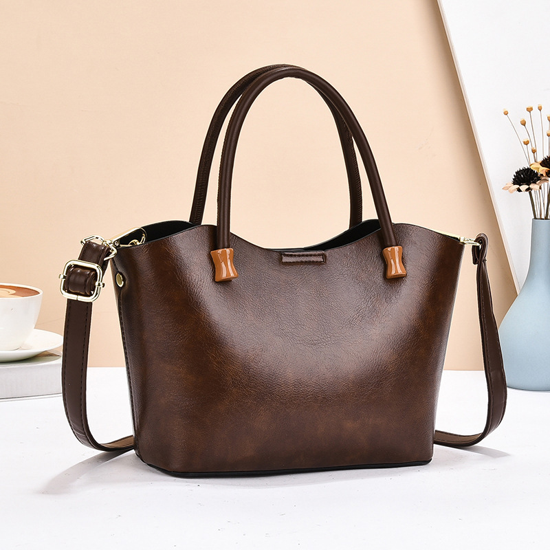 Bolsa de mano, bolsa de hombro de gran capacidad, bolsa de mochila, textura universal, comercio exterior, bolsas de mujer, bolsas transfronterizas de Taizhou