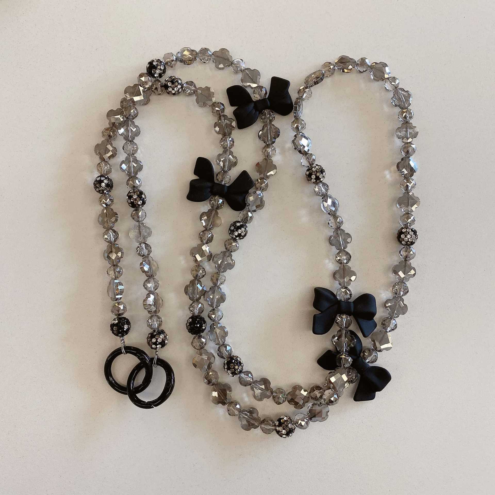 Mujeres de alta calidad hechas a mano colgante de teléfono móvil pulsera de arco negro de moda colgante larga colgante