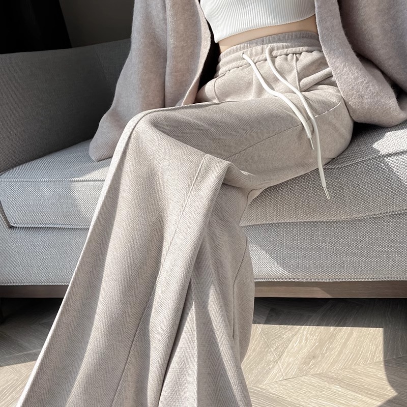 Pantalones de lana gris oscuro de piernas estrechas de mujeres otoño y invierno 2024 pantalones de cintura alta con patrón de herringbone de moda versátil pantalones rectos