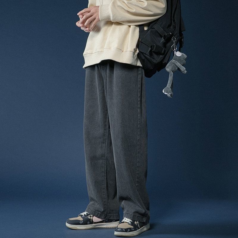 Hong Kong estilo retro pantalones vaqueros de color claro de los hombres sueltos todo partido casual de moda de pierna ancha Pantalones rectos de los hombres de la calle