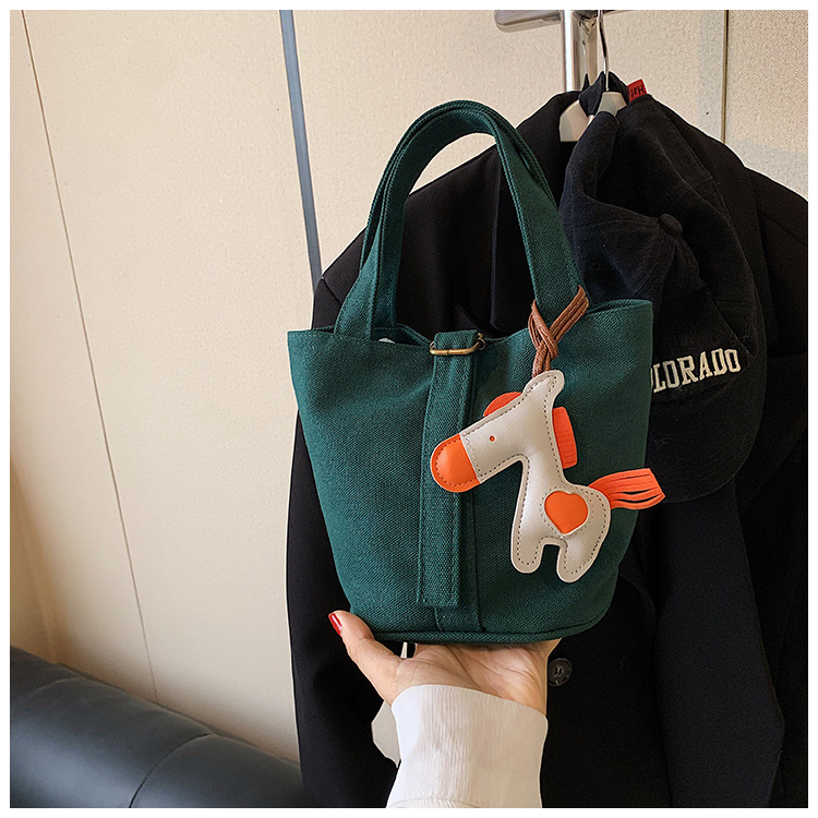 Bolso de mezclilla lindo de los niños de las mujeres 2023 Otoño Nuevo estilo coreano bolso de cubo de tela de color sólido para niños
