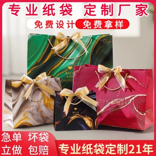 跨境手提袋定制纸袋定做烫金抽绳服装袋节日促销广告袋可印刷logo