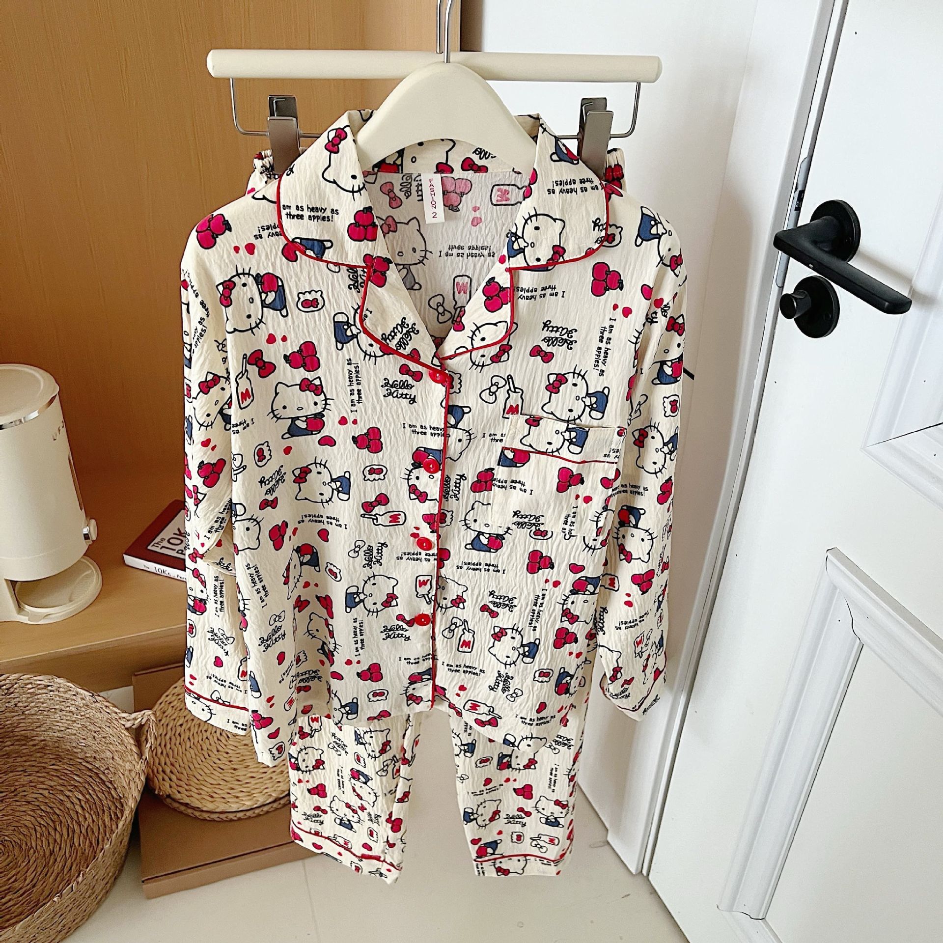Al por mayor transfronterizo otoño nuevo 140 g nubes camiseta de algodón pijama de manga larga de dibujos animados TK gato ropa de hogar se puede usar fuera