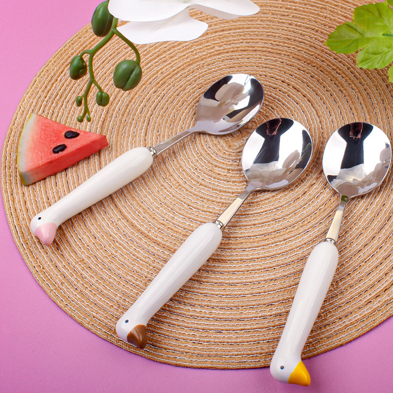 Svanformad sked i rostfritt stål med keramiskt handtag_voghion.com