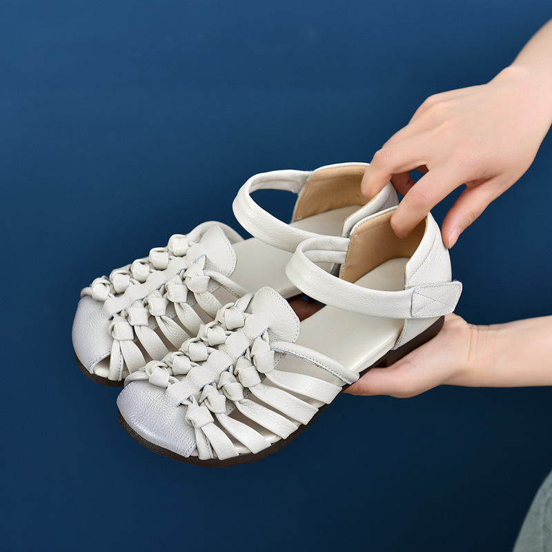 2025夏款英伦风真皮圆头手工编织女鞋轻便镂空罗马凉鞋平底鞋子